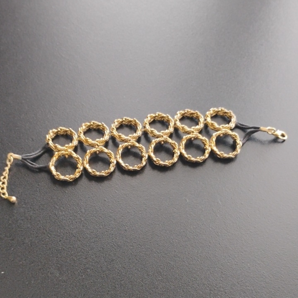Gold Tone Double Circle Ring Link Bracelet 7" with Black Cord Design